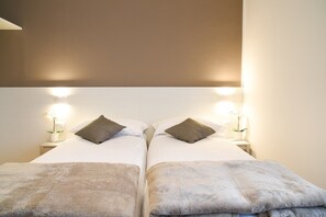 2 slaapkamers, een strijkplank/strijkijzer, gratis wifi, beddengoed