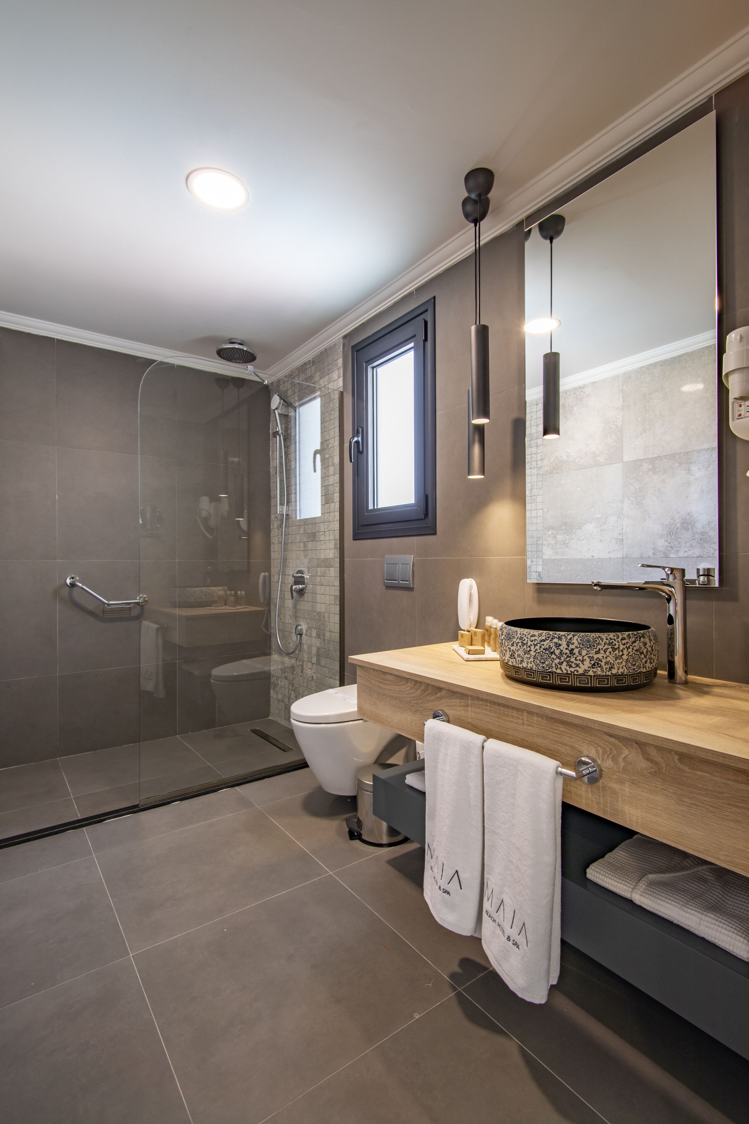 shower, free toiletries, hair dryer, bathrobes