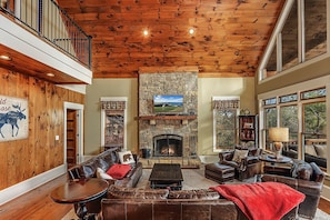 Smart TV, fireplace, video-game console, foosball