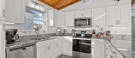 Fridge, microwave, dishwasher, coffee/tea maker