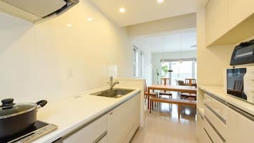 Fridge, microwave, stovetop, cookware/dishes/utensils