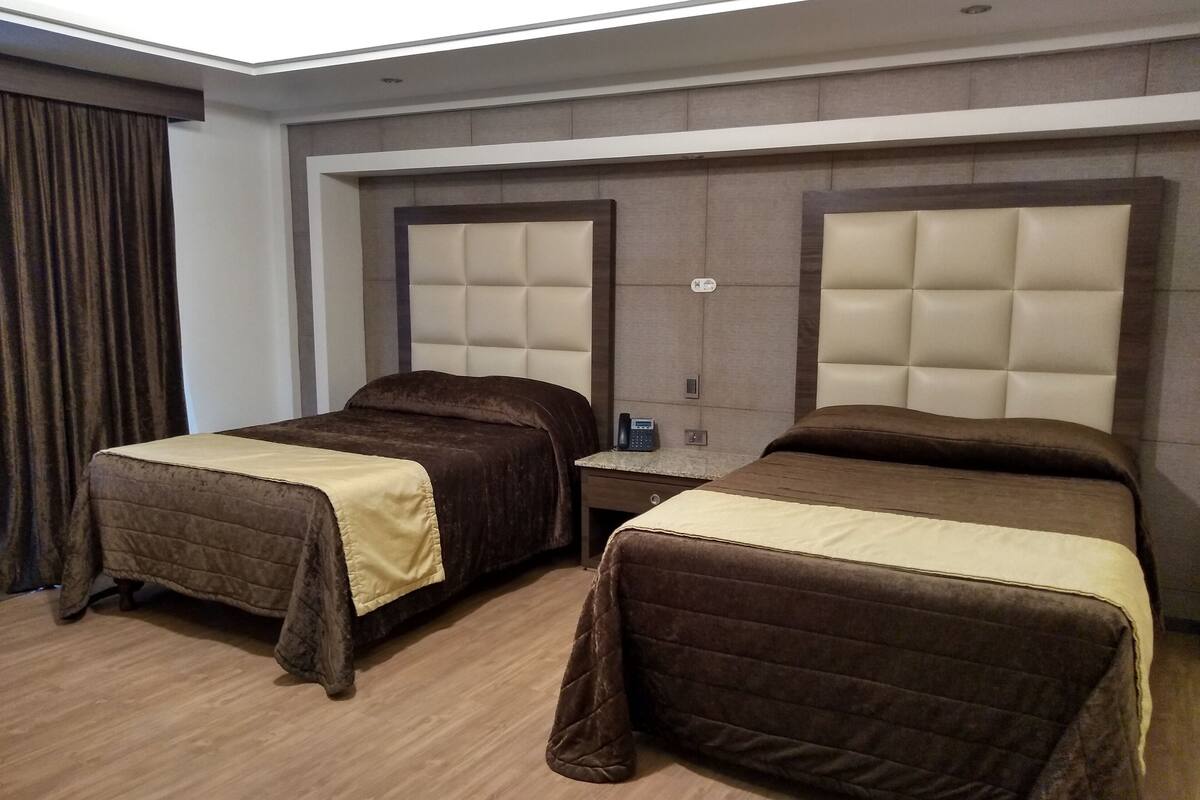 Luxury Quadruple Room | In-room safe, WiFi (free), bed sheets