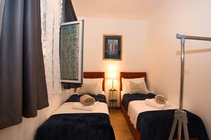 2 bedrooms, iron/ironing board, WiFi, bed sheets