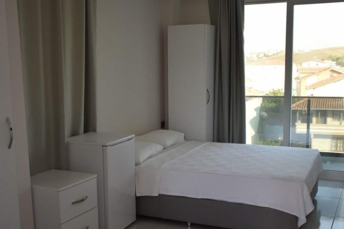 Deluxe Triple Room, Beach View | Desk, free WiFi