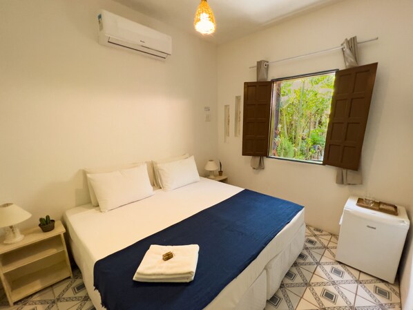 Basic Room | Minibar, blackout curtains, iron/ironing board, free WiFi