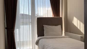 Deluxe Apartment, 2 Bedrooms | 2 bedrooms, desk, blackout curtains, iron/ironing board