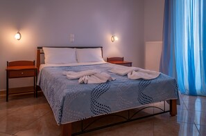 1 habitación, tabla de planchar con plancha, wifi gratis y ropa de cama 