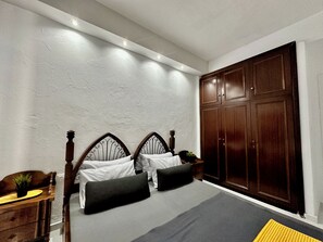 4 bedrooms, desk, iron/ironing board, travel cot