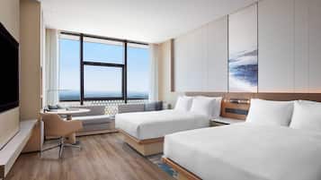 Premium bedding, down comforters, minibar, in-room safe