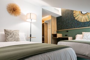 Standaard eenpersoonskamer, uitzicht op bergen, aan tuin | Donsdekens, een minibar, een kluis op de kamer, verduisterende gordijnen