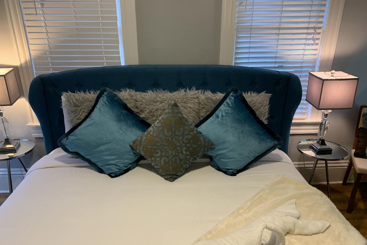 Luxury Room, 1 King Bed, Ground Floor | 1 bedroom, down comforters, memory foam beds, individually decorated