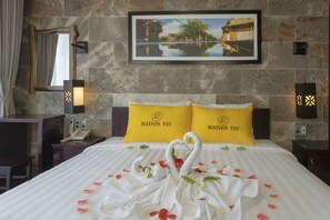 Premium bedding, pillowtop beds, desk, blackout drapes