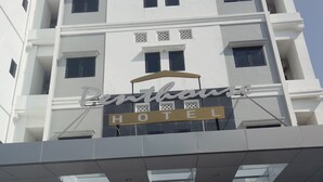 A hotel entrance with a sign reading "Penthouse Hotel". - Ams Penthouse (Jakarta)