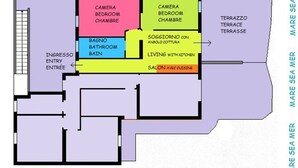Plànol d'un hotel amb habitacions identificades, incloent un dormitori, un bany i una terrassa.