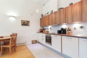 Apartment (1 Bedroom) | Private kitchen | Fridge, microwave, oven, stovetop