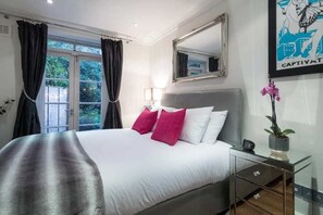 2 bedrooms, desk, laptop workspace, iron/ironing board