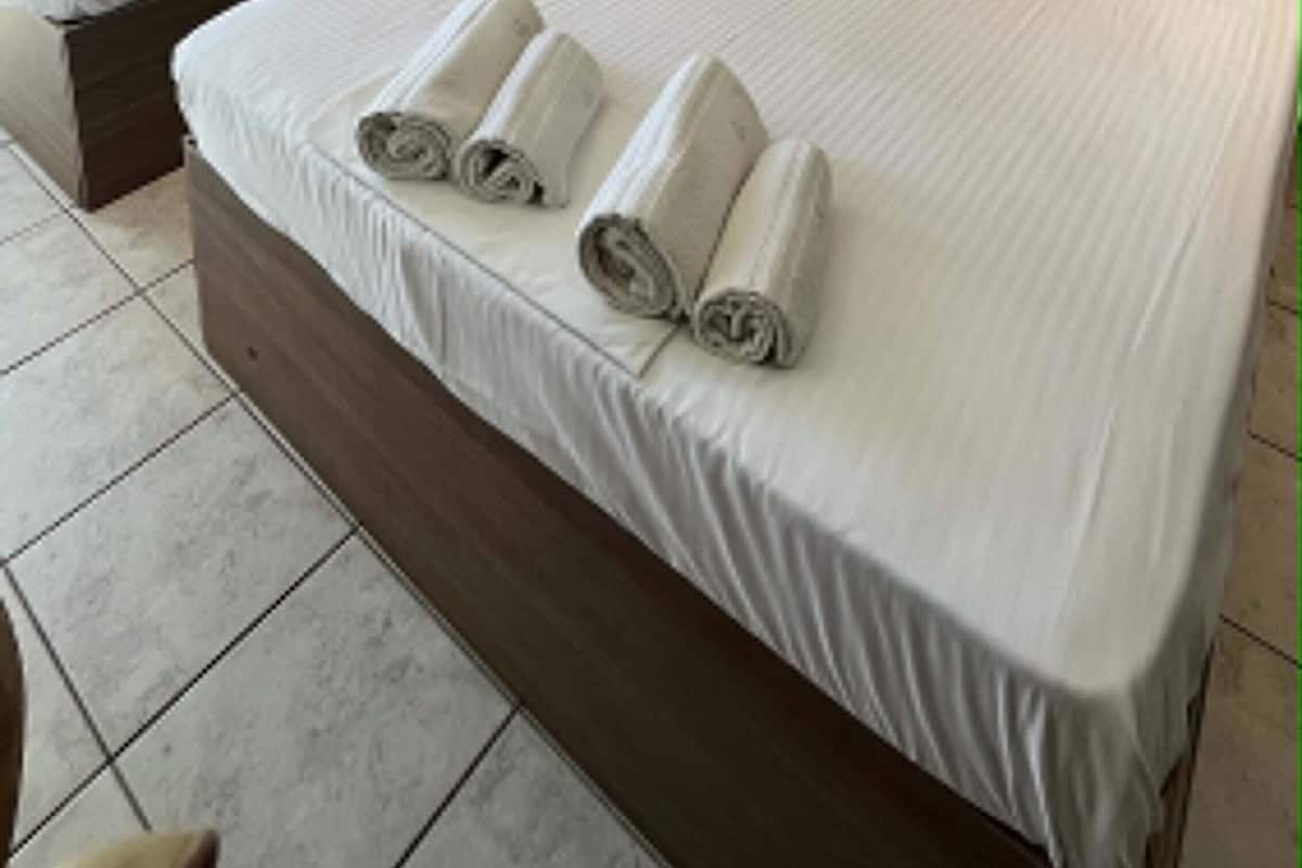 Family Condo | Egyptian cotton sheets, premium bedding, down comforters
