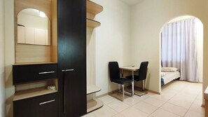 Deluxe Apartment, 1 Bedroom, City View | Living area | 32-inch flat-screen TV with cable channels, TV - Apartments Levada  (Kharkiv)
