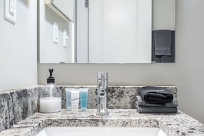 Bathtub, hair dryer, towels