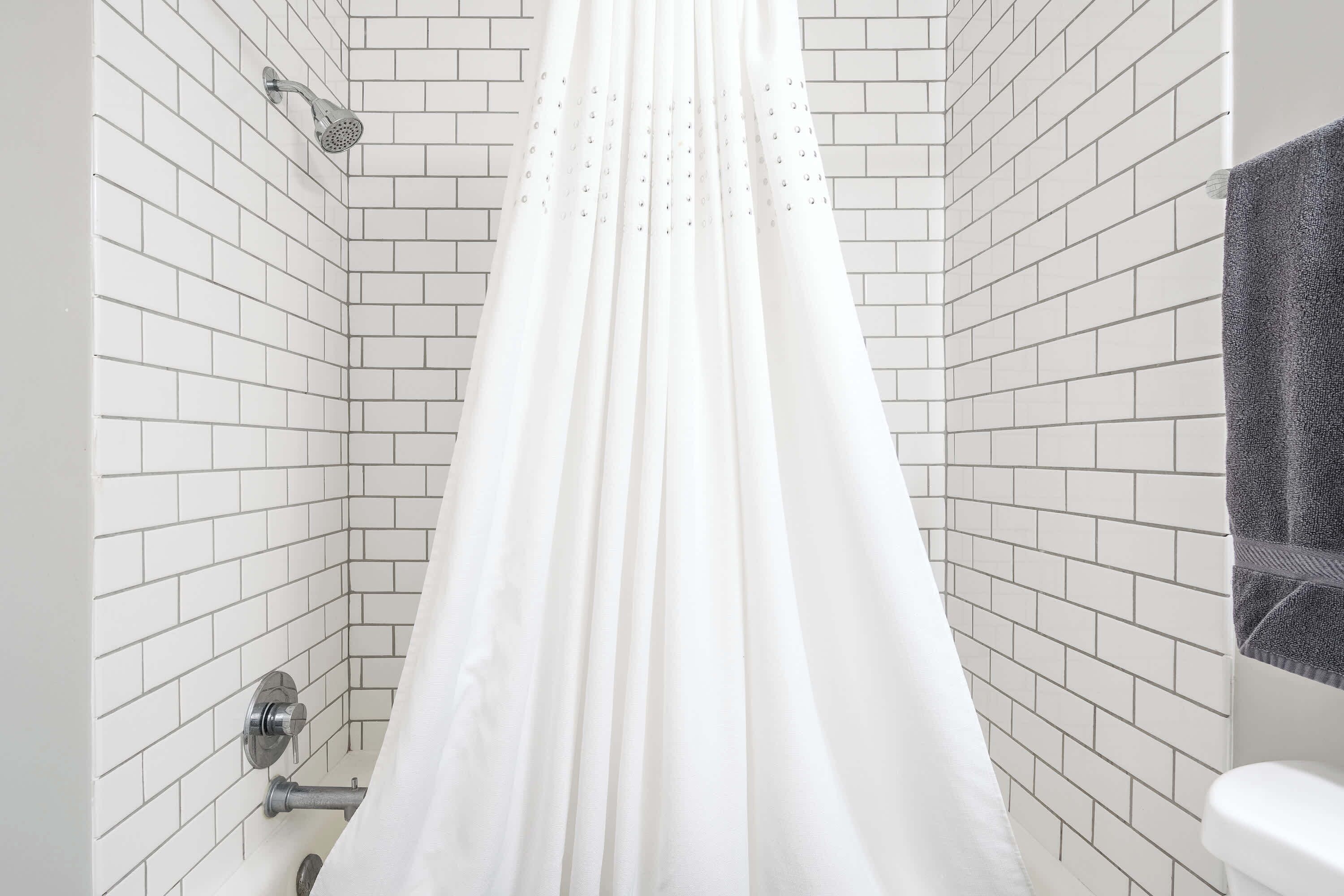 Bathtub, hair dryer, towels