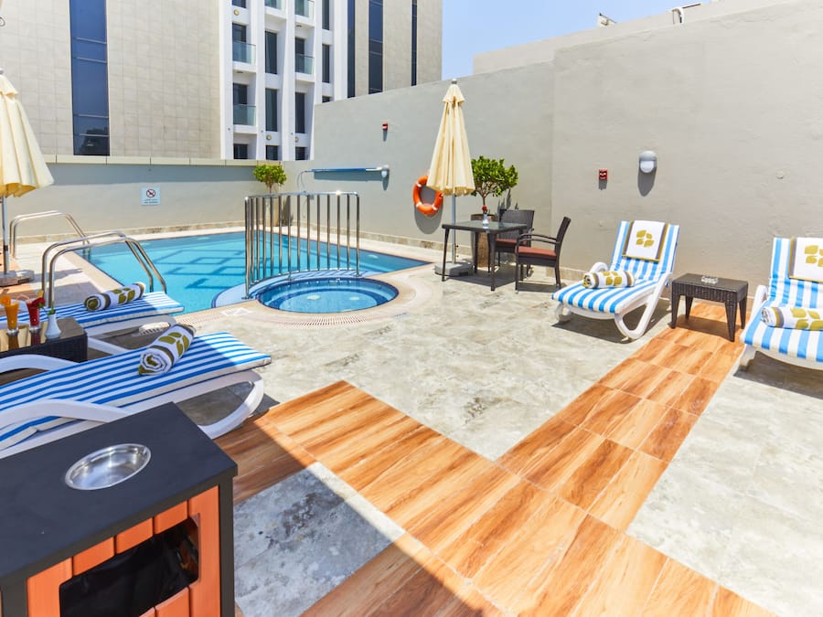 Outdoor pool, open 9:00 AM to 8:00 PM, pool umbrellas, sun loungers