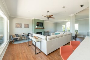 TV, fireplace, books