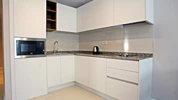 Apartment, 2 Bedrooms | Private kitchenette | Stovetop, dishwasher, cookware/dishes/utensils