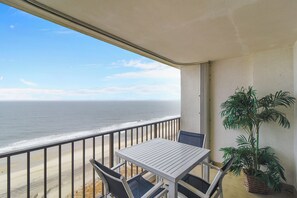 Outdoor dining - DAILY ACTIVITIES & LINENS INCLUDED*!! Direct Oceanfront  2  bedroom, 2 bath with an open den (set up as dining room). (Ocean City)