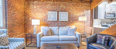 Suite Studio, 1 très grand lit et 1 canapé-lit | Coin séjour