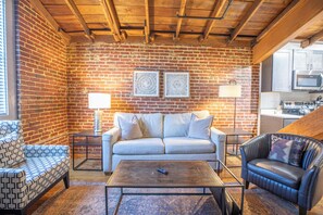 Studio Suite, 1 King Bed with Sofa bed | Living area | 55-inch Smart TV with cable channels, TV - The Lofts at Downtown Salem (Salem)