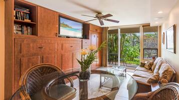 Condo, 1 Bedroom, Garden View | Living room | 32-inch flat-screen TV with cable channels, TV, DVD player