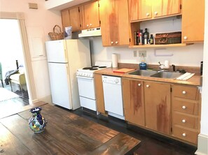Enjoy cooking in this well-equipped kitchen with an oven and sink.
