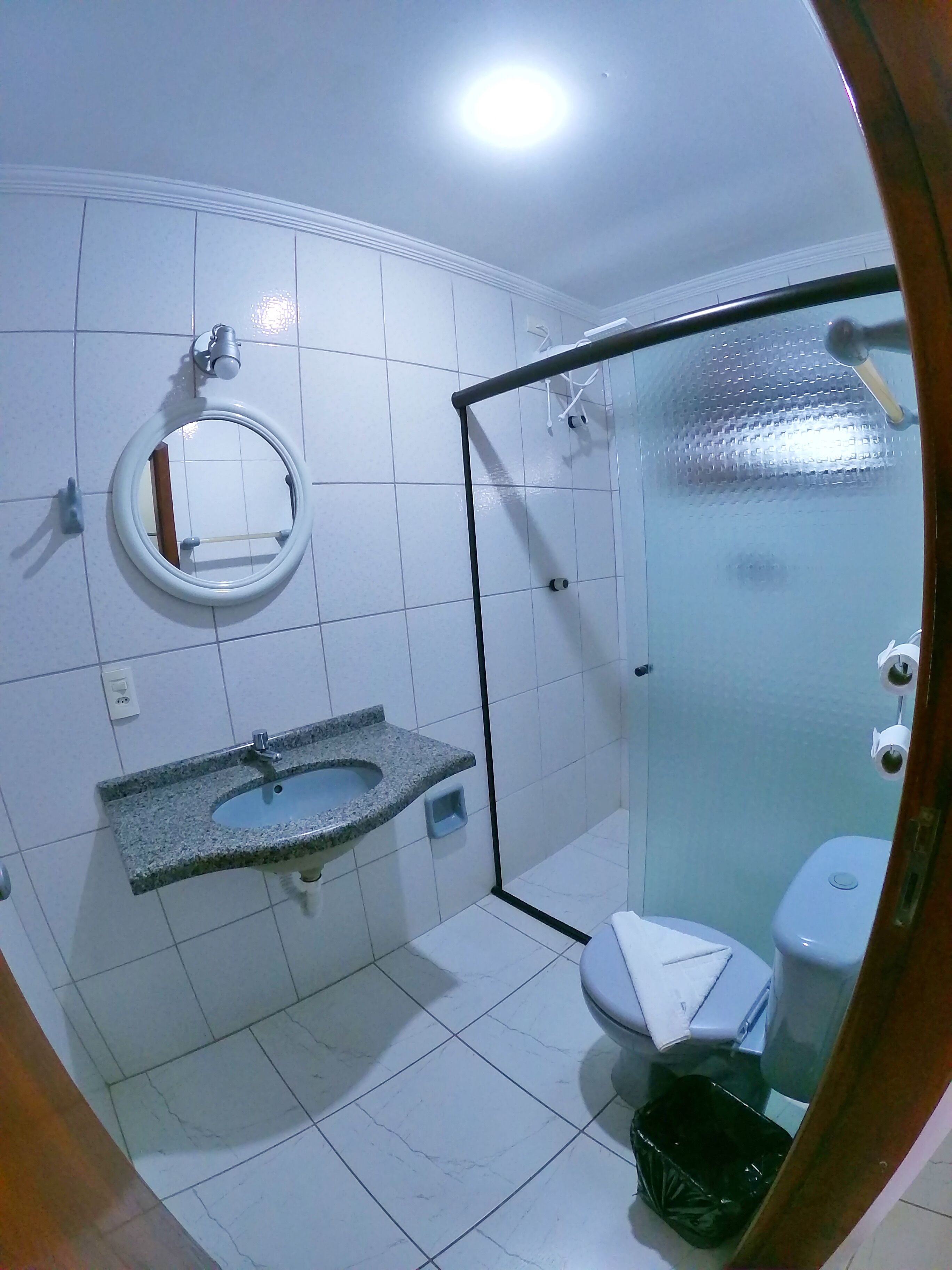 shower, rainfall showerhead, hair dryer, towels