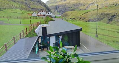 The house is in Saksun, which is north of StrĂžmĂž.