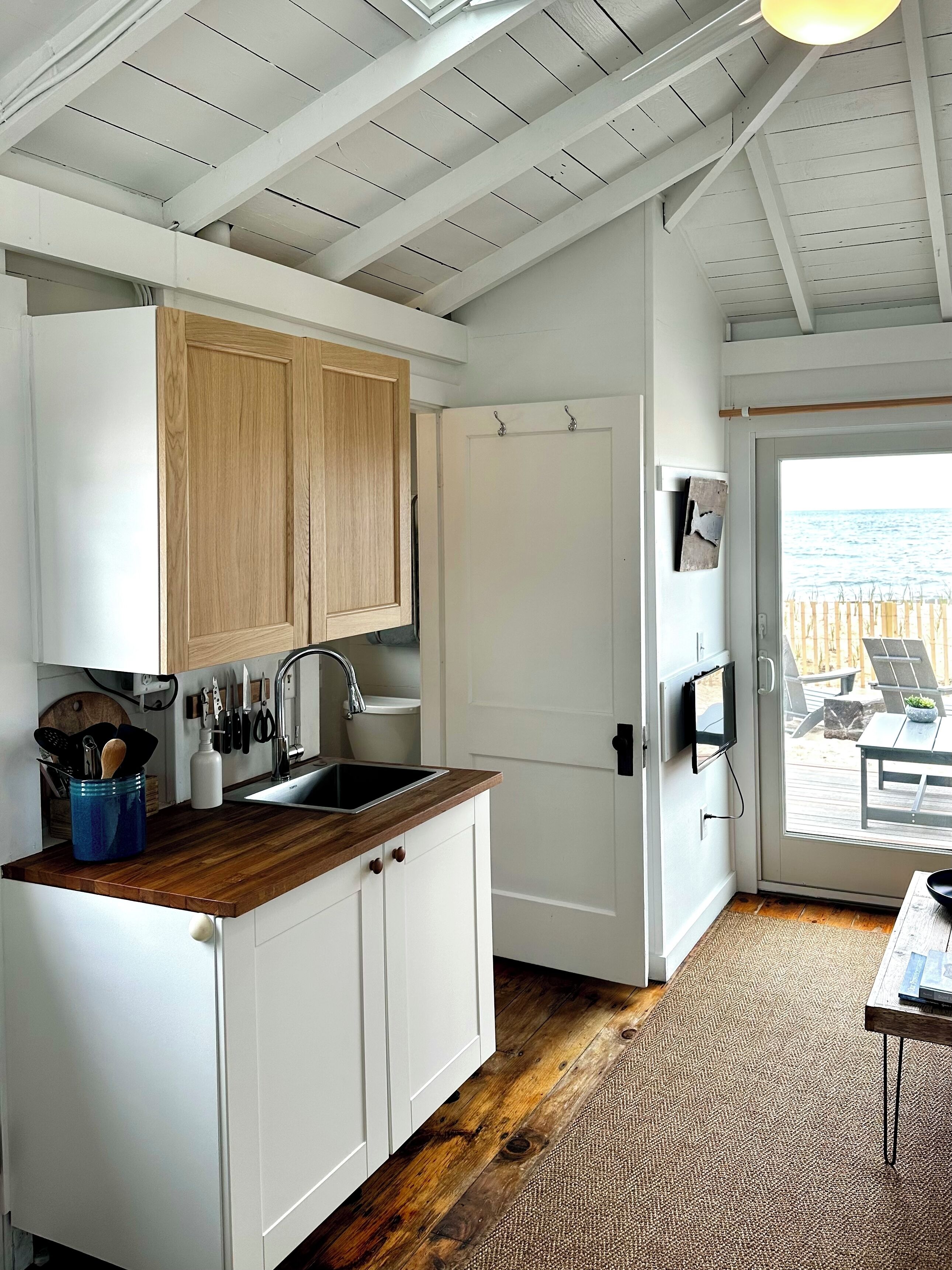 Fridge, microwave, stovetop, coffee/tea maker