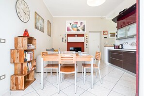 Dining - GuestHost - The apartment is located on the first floor of a building without a lift.There are 31 steps.In 50 square meters of space, it comfortably accommodates 2 people, with a double bedroom and a sofa in the living room.Balcony. Free uncovered parkin (Bologna)