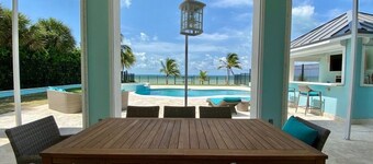 Blue Birds Beach House, right on the beach with a large backyard & heated pool.