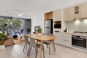 Two Bedroom Apartment With Parking | Dining room - Urban Edge Apartments by Urban Rest (Kelvin Grove)