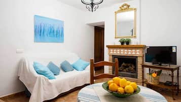 Televisión y chimenea