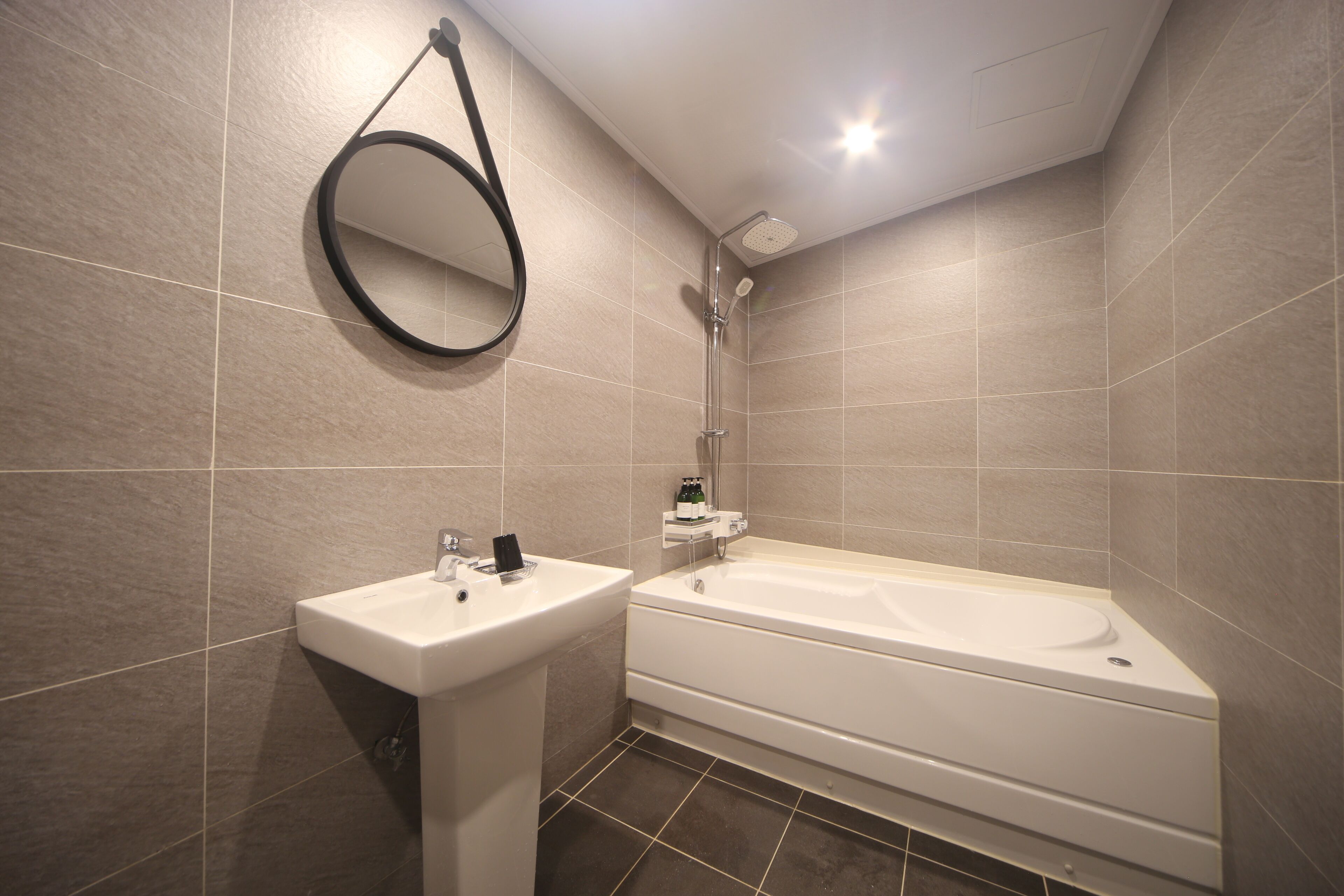 designer toiletries, hair dryer, bidet, towels