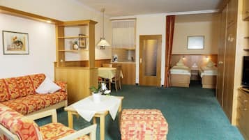 Comfort Apartment | Living area | Flat-screen TV