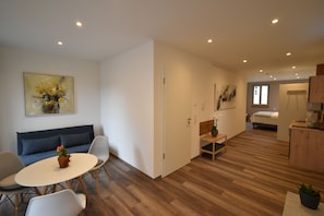 Appartement Design | Aire de séjour | Téléviseur
