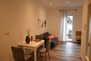 Appartement Design | Aire de séjour | Téléviseur
