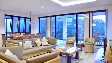 Family Villa | Living area | 32-inch LCD TV with satellite channels, TV, DVD player