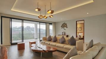 Family Villa | Living area | 32-inch LCD TV with satellite channels, TV, DVD player