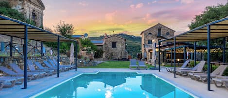 Seasonal outdoor pool, pool umbrellas, sun loungers