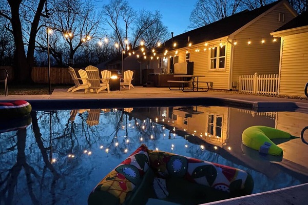 Enjoy the ultimate relaxation with poolside vibes, a soothing hot tub, and a cozy fire pit. Whether you're playing backyard games, grilling your favorite meal, or just lounging under the twinkling lights, this space is your perfect escape for a wonde