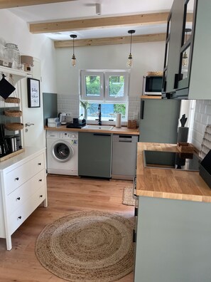 Bungalow, Private Bathroom, Partial Sea View | Private kitchen | High chair - Bungalow Park am Salzhaff (Am Salzhaff)