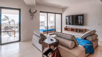 Condo Premier | Sala de estar | Smart TV