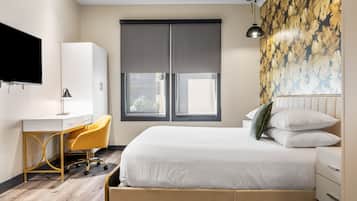 Ropa de cama de alta calidad, colchones con pillow-top y escritorio